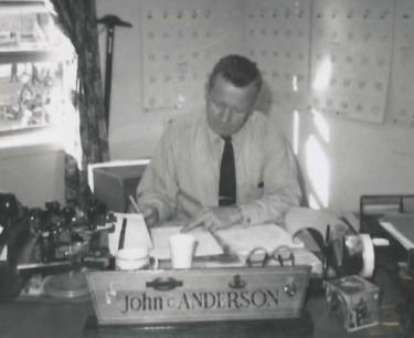 SGM John C. Anderson, at his ROTC office desk.