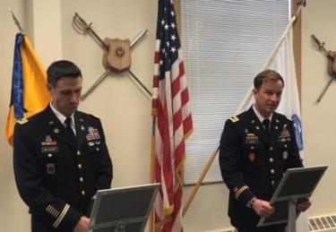 LTC Mark Van Gelder (left) and MAJ Joshua James (right) hosting the Spring 2020 Commissioning Ceremony in the Army ROTC Cadet Lounge on the CU-Boulder campus.