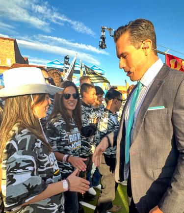 Army ROTC Cadets shaking hands with Fox Big Noon Kickoff Host Brady Quinn during the pre-game show on September 30th. Photo courtesy of CDT William Vlad.