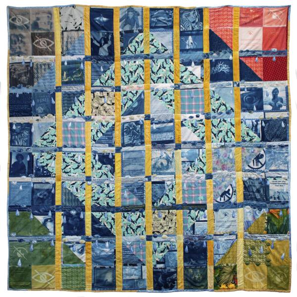 Marcella Marsella (MFA). Sensitive Content Quilt, Cyanotype on muslin, googly eyes, puffy paint, rhinestones, SolarFast dye, store-bought fabric, 96 x 96