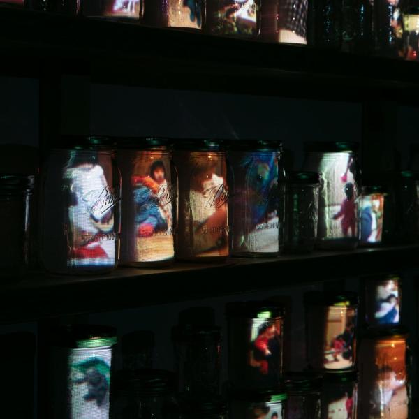 Past Present, Canning Jars, lumber, projection, sugar, salt. 2022
