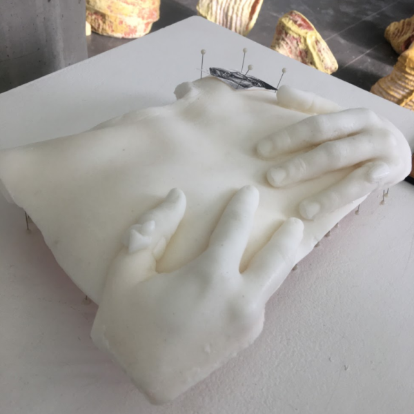 Madeline Sturm. "Body Work," paper, wax, metal, plastic, ink. 7"x13"x3". 2019