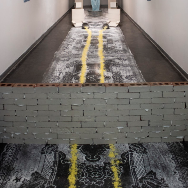 Javier Padilla-Gonzalez. "Motherland," Lard, White Sugar, Brown Sugar, Bricks, Paint, Plaster. 5' x 7'. 2019