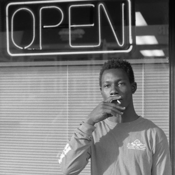 Evan Tooley. "College smokers," black and white gelatin print. 8"x10". 2019