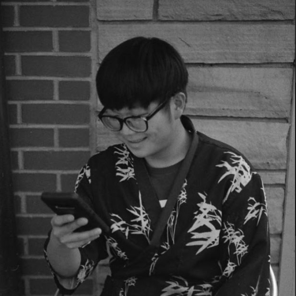Evan Tooley. "College smokers," black and white gelatin print. 8"x10". 2019