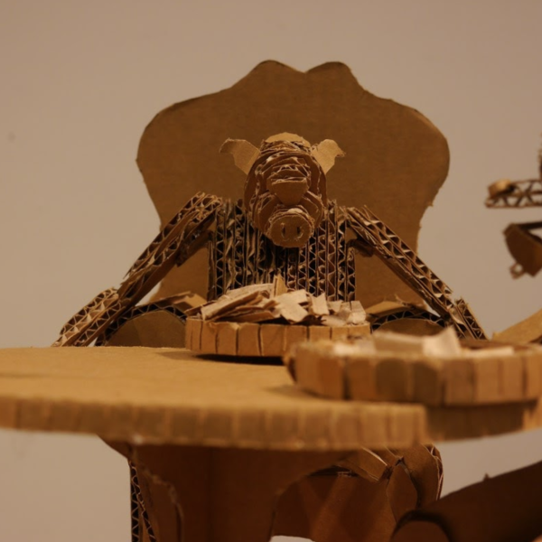 Brandon Montalvo. "Animalistic consumption," Cardboard. 8"x1.5"x1.5". 2019
