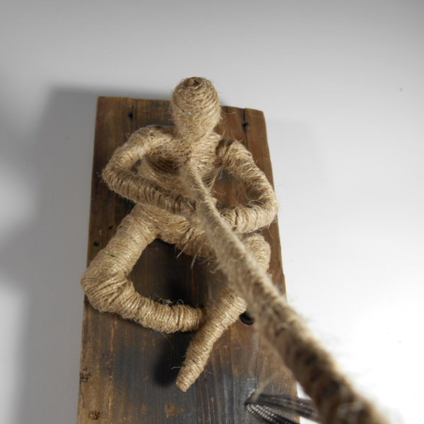 Emma Kluthe. "Anchor," newspaper, twine, wood, metal. 2'x2.5'x5'. 2016