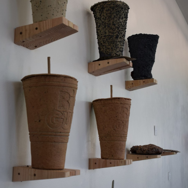 Wolf Edberg. "a very nervous gulp," sawdust, glaze sludge, metal chips, fiberglass insulation, stoneware clay. 8'x10'x1'. 2019