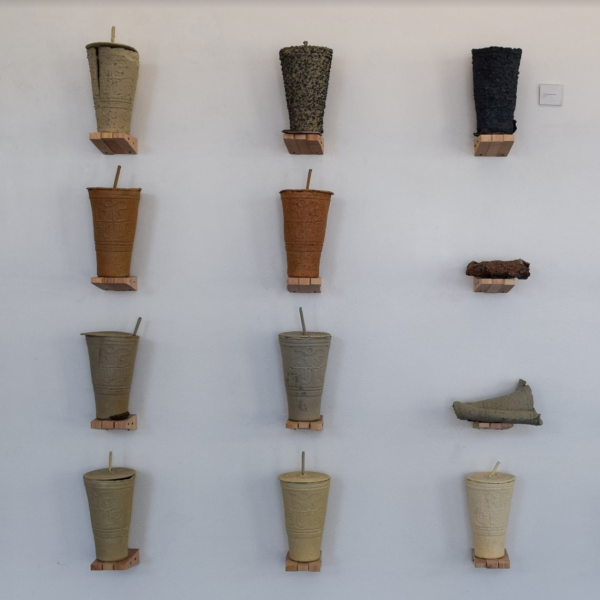 Wolf Edberg. "a very nervous gulp," sawdust, glaze sludge, metal chips, fiberglass insulation, stoneware clay. 8'x10'x1'. 2019