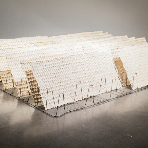 Emily Irvin, "tremors," pressing and filing fingerprints, 86x45x26”