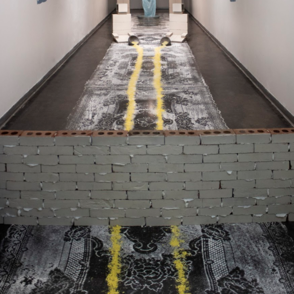 Javier Padilla-Gonzalez. "Motherland," Lard, White Sugar, Brown Sugar, Bricks, Paint, Plaster. 5' x 7'. 2019