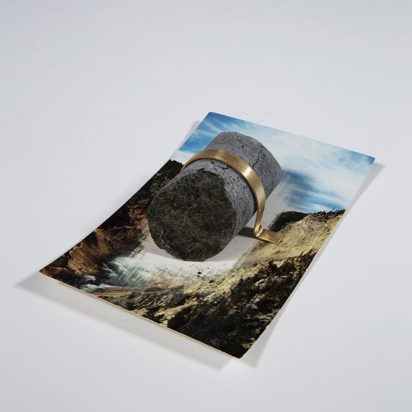 "Anthropogenic Monument 1," Erased Western postcard, mineral core, bronze, ink 3.5” x 5” x 1.5” 2019