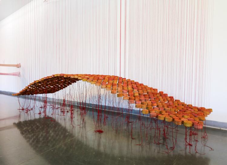 "Hopium," 2021. Paper, food coloring, crochet thread, fabric. 8’x15’x4'.