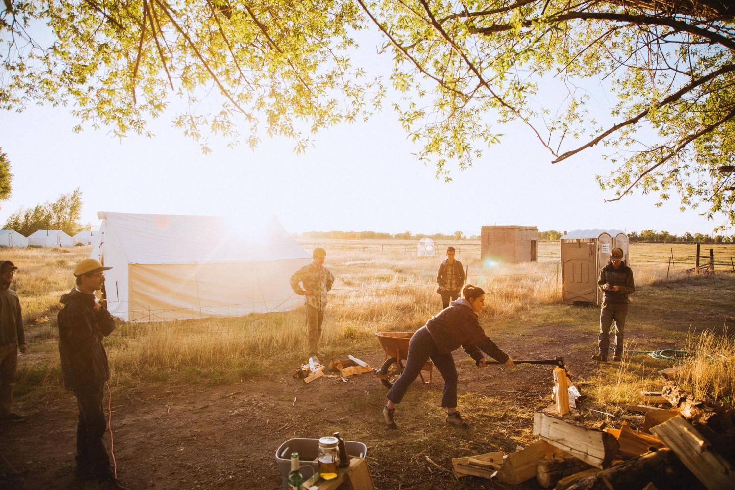 Students chopping wood