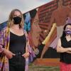 Allyson Burbeck with mural
