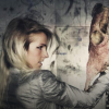 Image of Lisa Solberg holding a cow skull