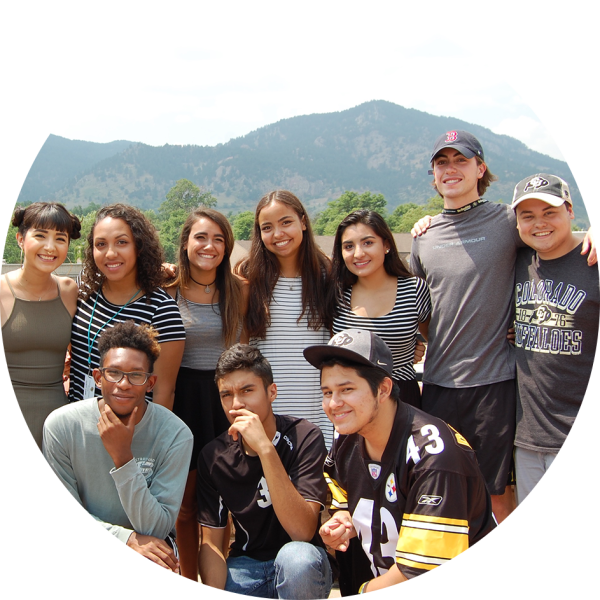A group of MASP students smiles at the camera.