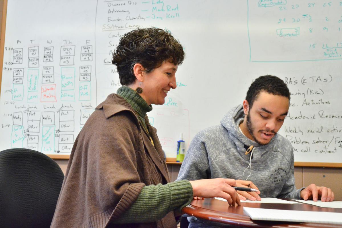 Photograph of an advisor with student