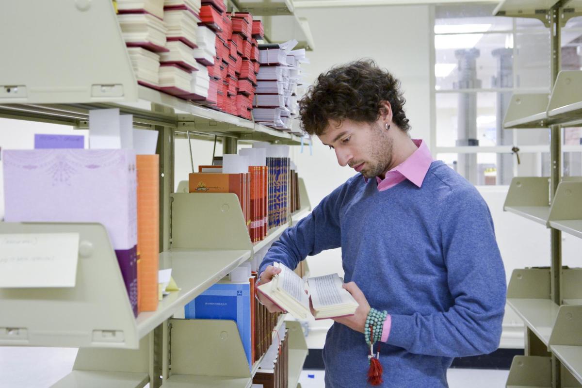 Photograph of student in the libraries