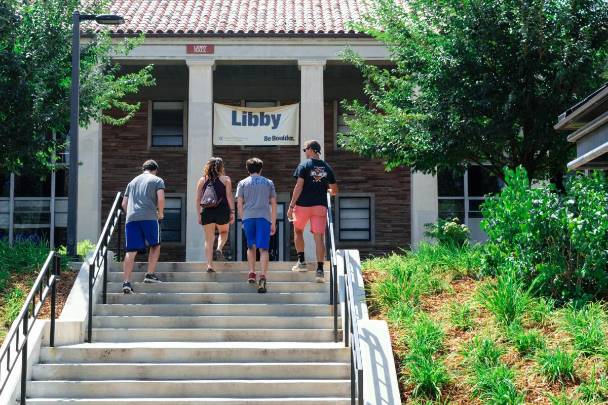 Photograph of a family walking into Libby