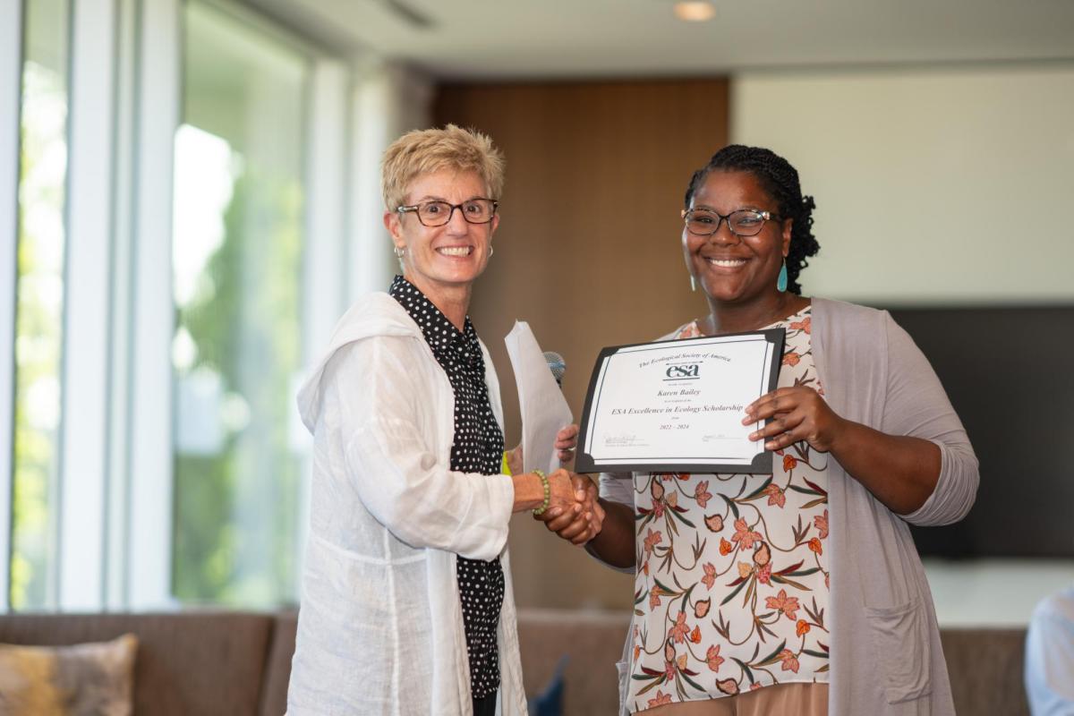 Karen Bailey with award