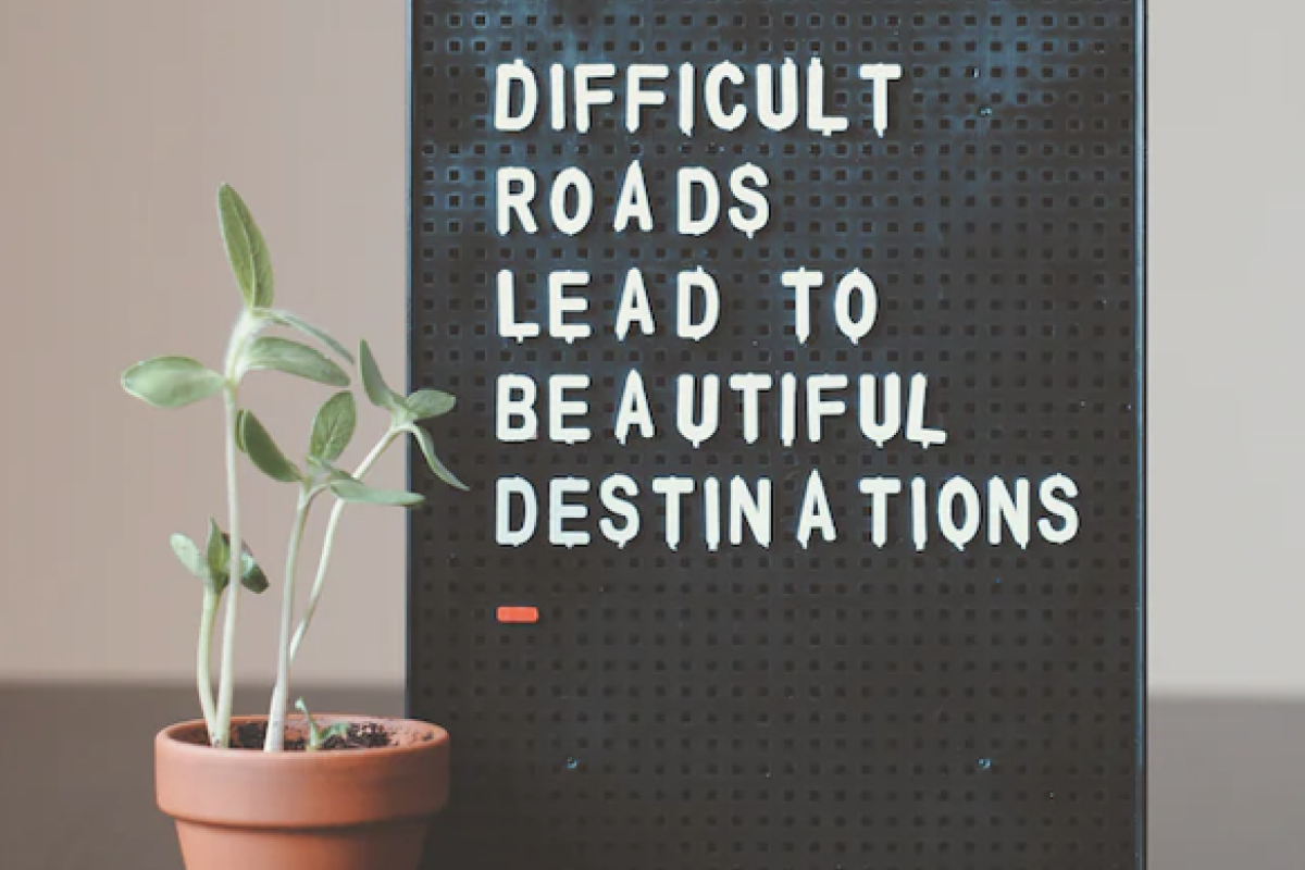 Motivational sign: Difficult roads lead to beautiful destinations