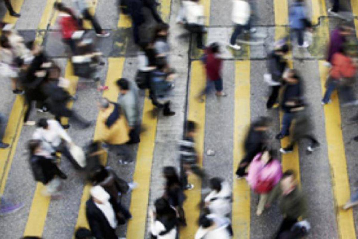 Stock photograph of a crowd walking