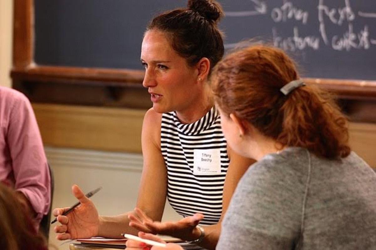 Photograph of Beechy working with students
