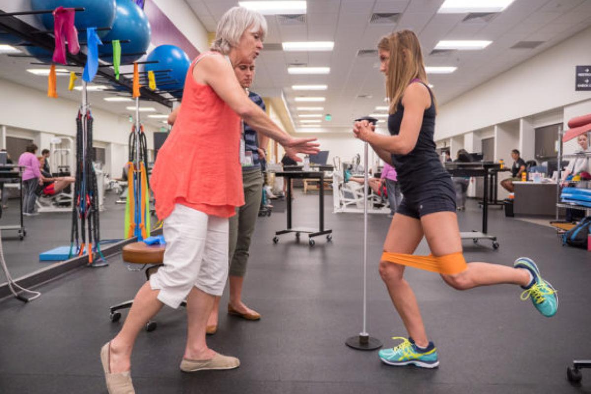 People performing physical therapy