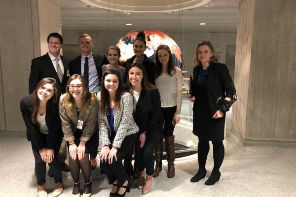 Students gather at the World Bank for a group photo.