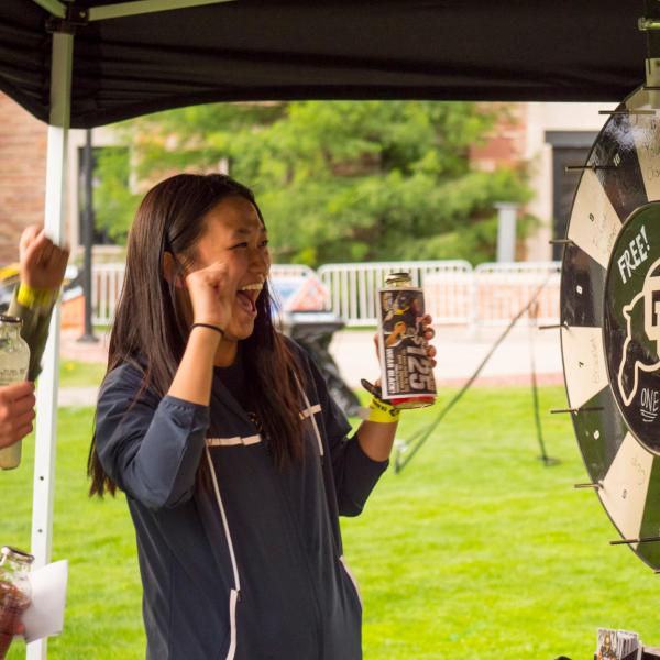 student spins prize wheel