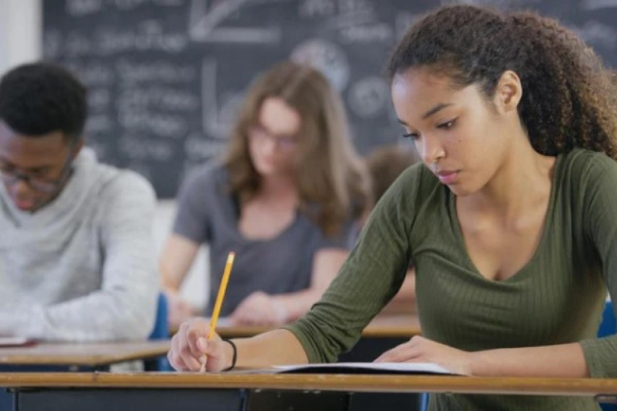 Student taking a test in a classroom