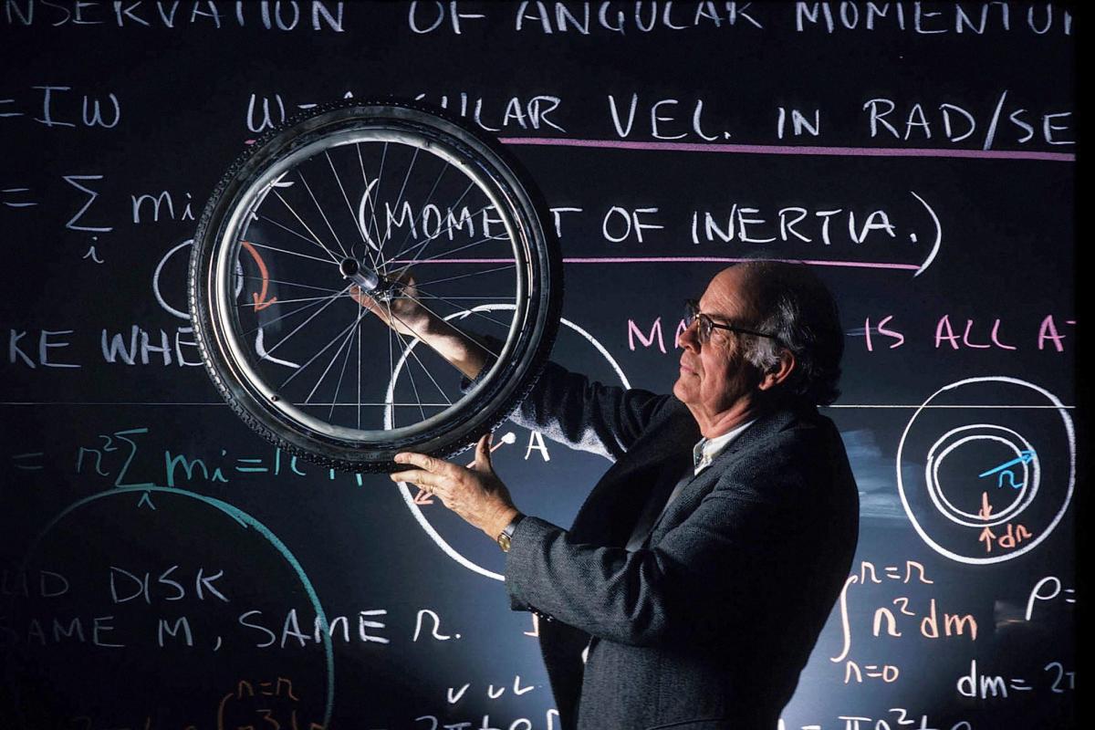 Physics professor spinning a bicycle wheel