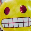 A giant balloon appears to make an uncomfortable face.