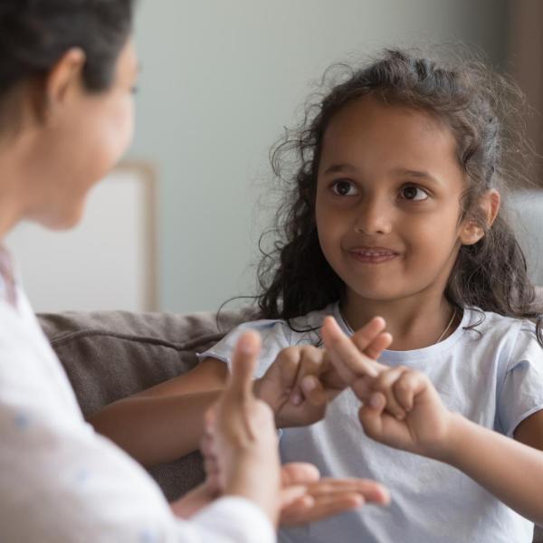 girl speaking American Sign Language