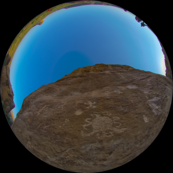 A petroglyph of an eclipse is seen with a wide-angle lens in a photograph at Chaco Canyon, where CU-Boulder researchers captured a rare Aurora Borealis in the southern night sky. Photo courtesy of Fiske Planetarium.