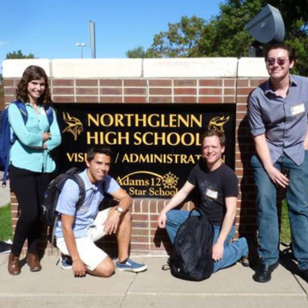 Literary Buffs (left to right) Sydney Chinowski, André Gianfrancesco, Sean Guerdian and Lukas DeVries strike a pose outside Northglenn High School, where they coached future college students on preparing college-level papers.