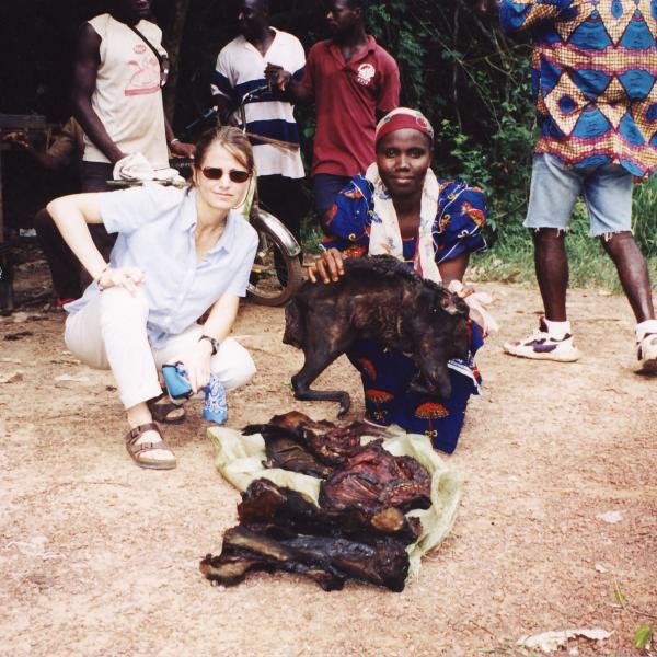 Lambert with a bushmeat vendor at the border of Cote d’ivoire and Liberia. She noted: "I was doing a survey. What was coming over the Cavally River (that separates the two countries) was mostly smoked primates and duiker. Soldiers in Liberia were brandishing their weapons at me because they saw what I was up to." Photo courtesy of Joanna Lambert.