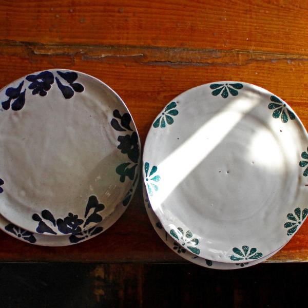 blue and white ceramic plates