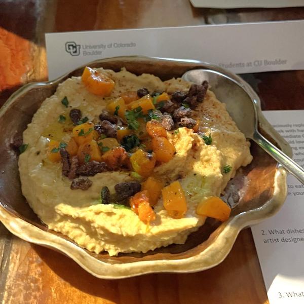 Hummus in ceramic dish