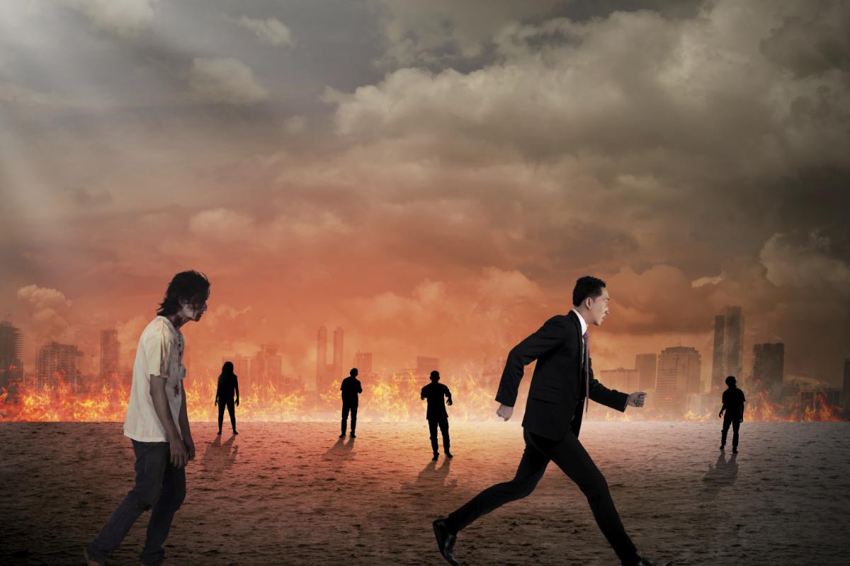 Man running from zombies