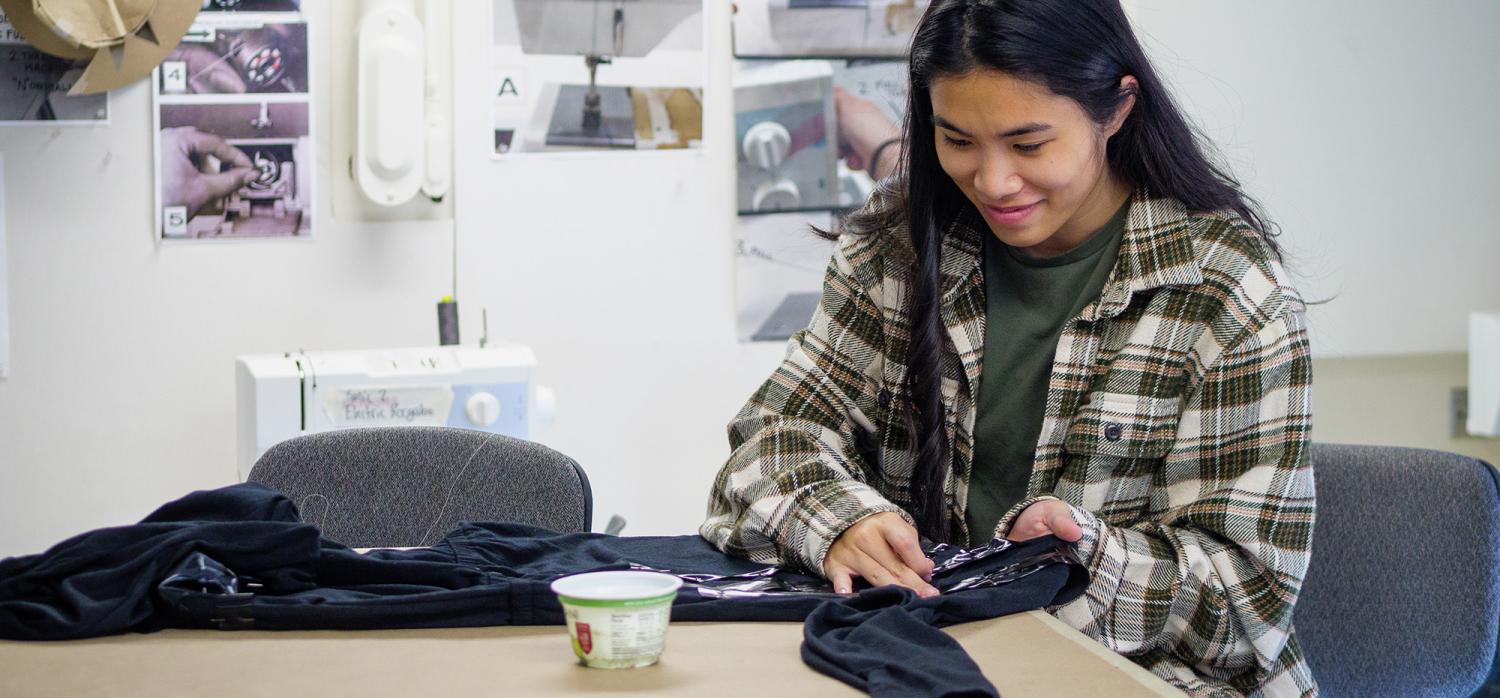 Student making a costume