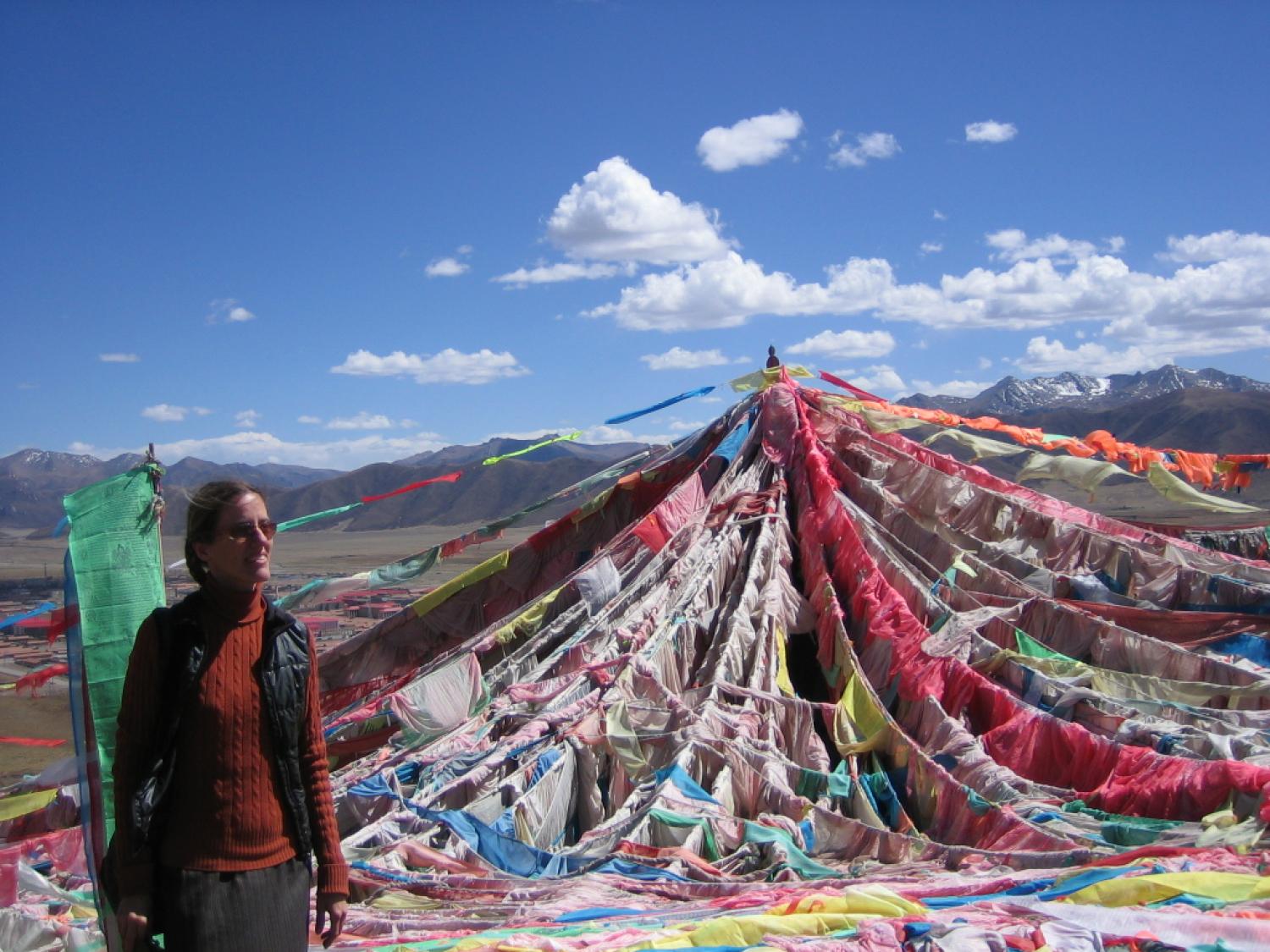 Holly Gayley, assistant professor of religious studies at CU-Boulder, takes in the view near the Amne Machen Range in Tibet. Photo courtesy of Holly Gayley.