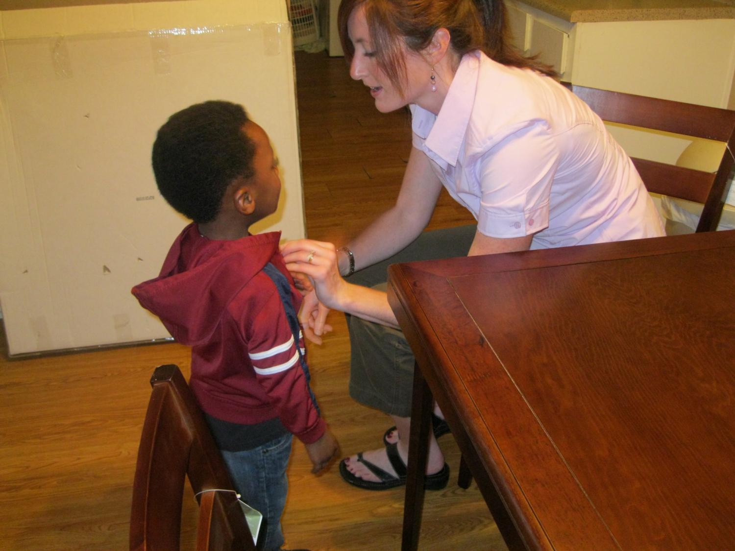 Lori Peek with small child after Hurricane Katrina