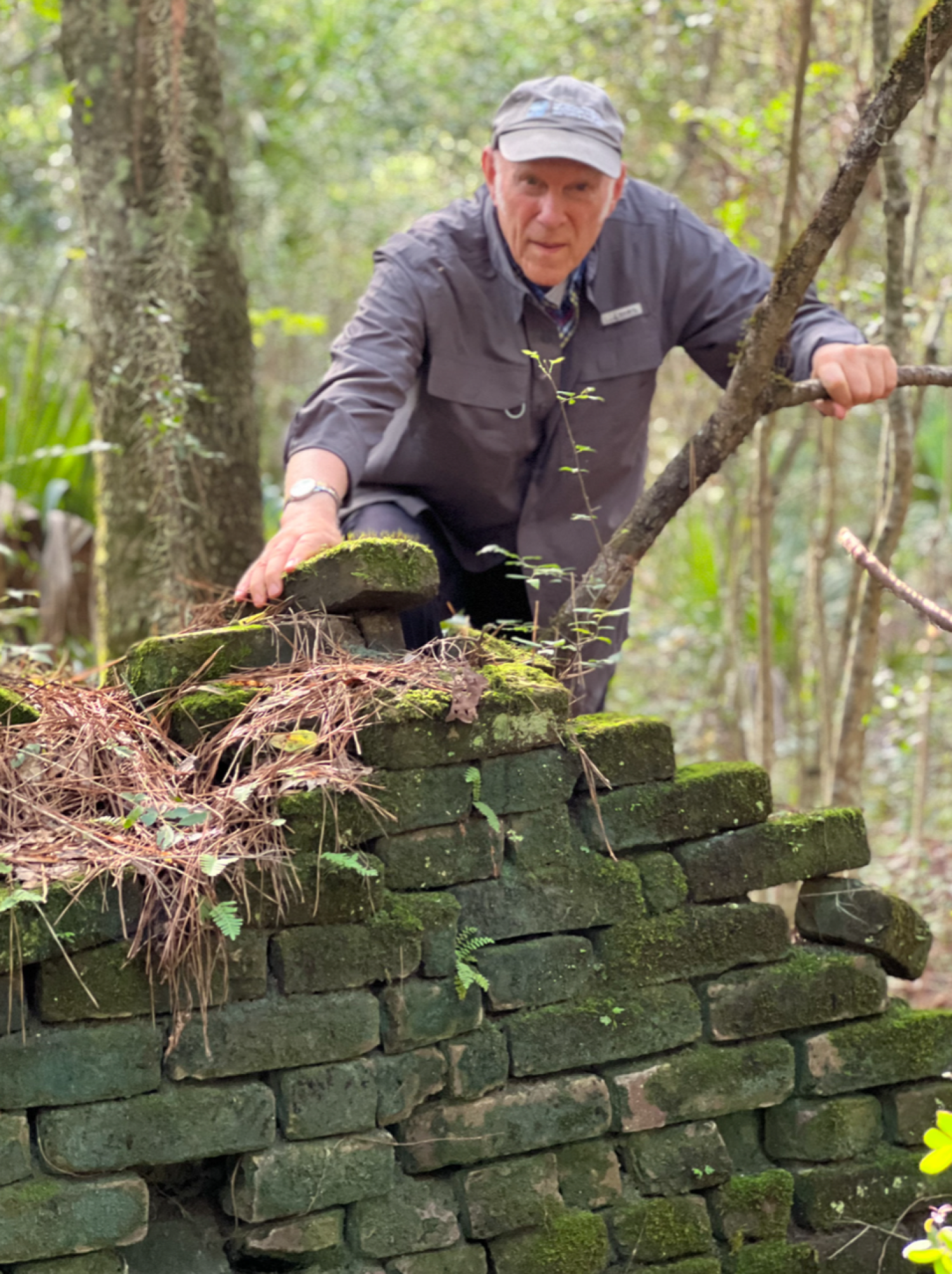 Peter H. Wood exploring chimney remains