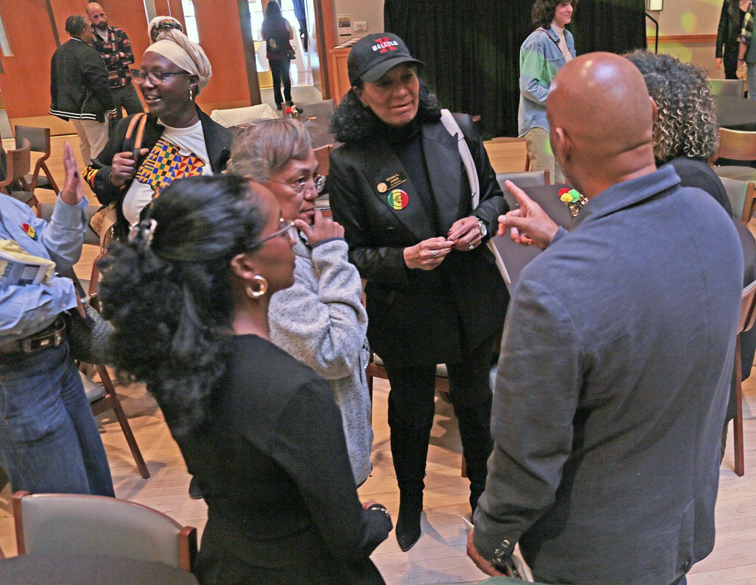 Wanda James talking to a group of people