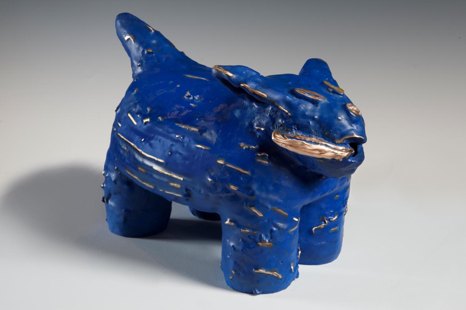 Blue, dog-like sculpture by Melanie Yazzie titled "Simon Joe Benally is Looking for a Rich Girlfriend"