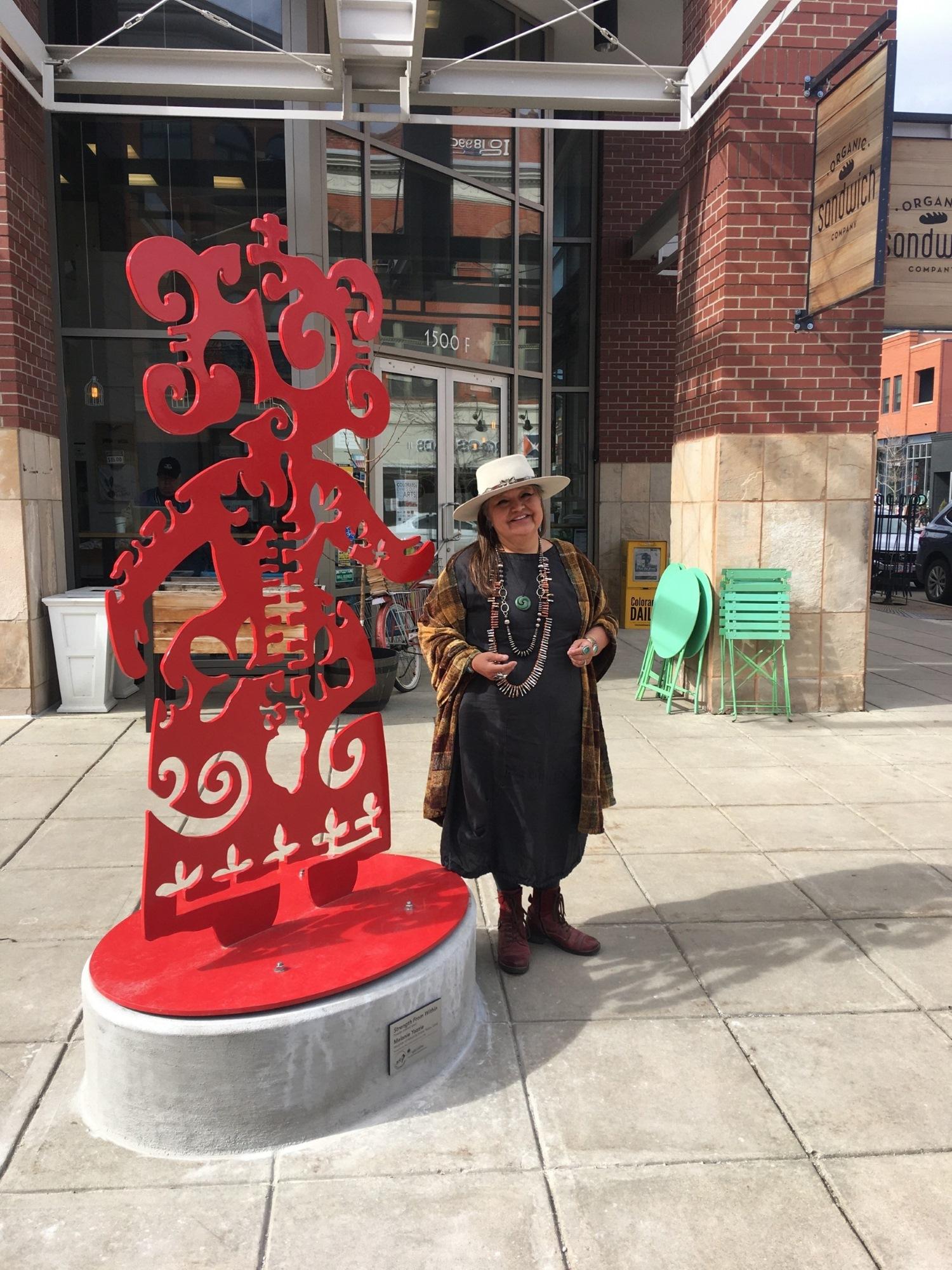 Melanie Yazzie with her sculpture "Strength from Within"