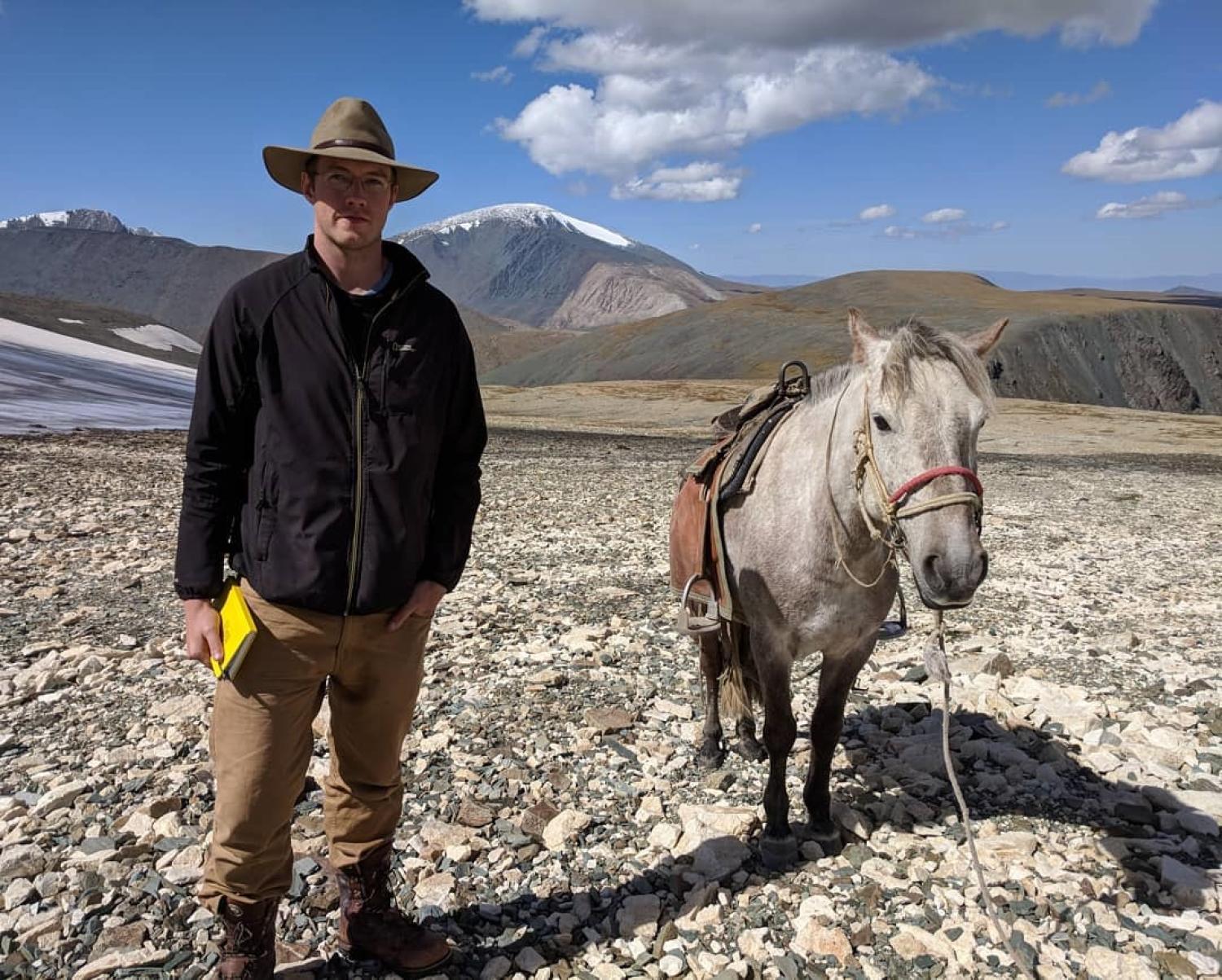 William Taylor with a white horse
