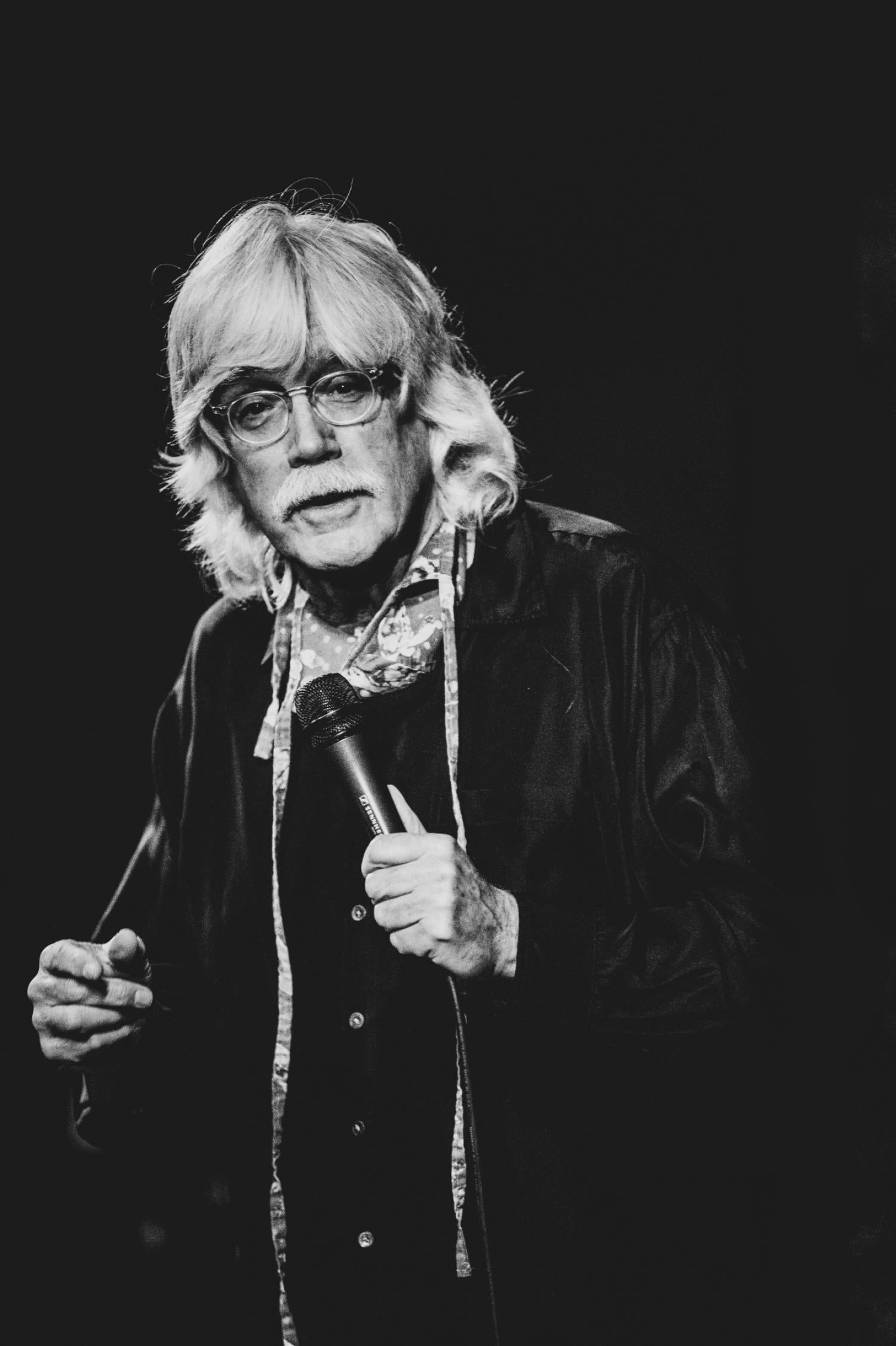 Kevin Fitzgerald performing standup comedy onstage